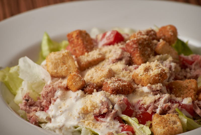 Fresh Caesar salad side at Seasons pizza
